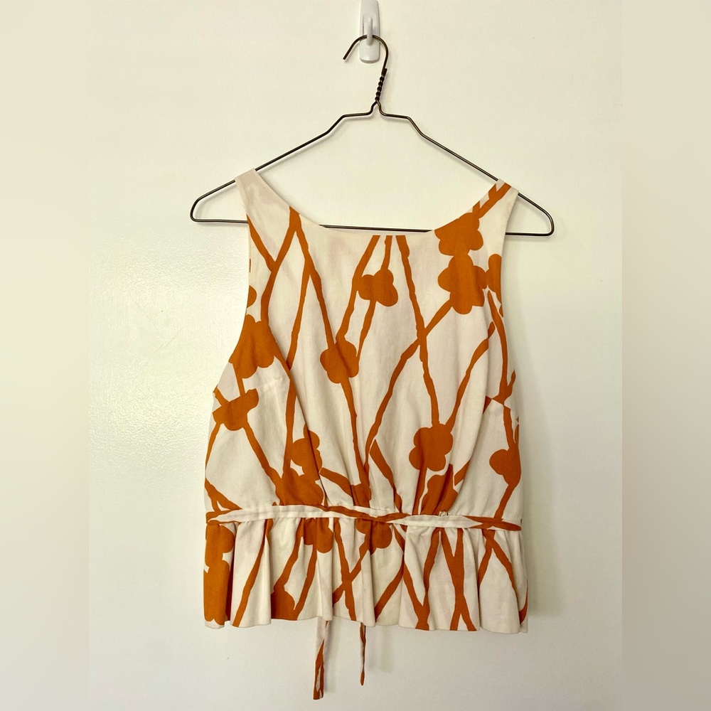 Peplum tie back blouse